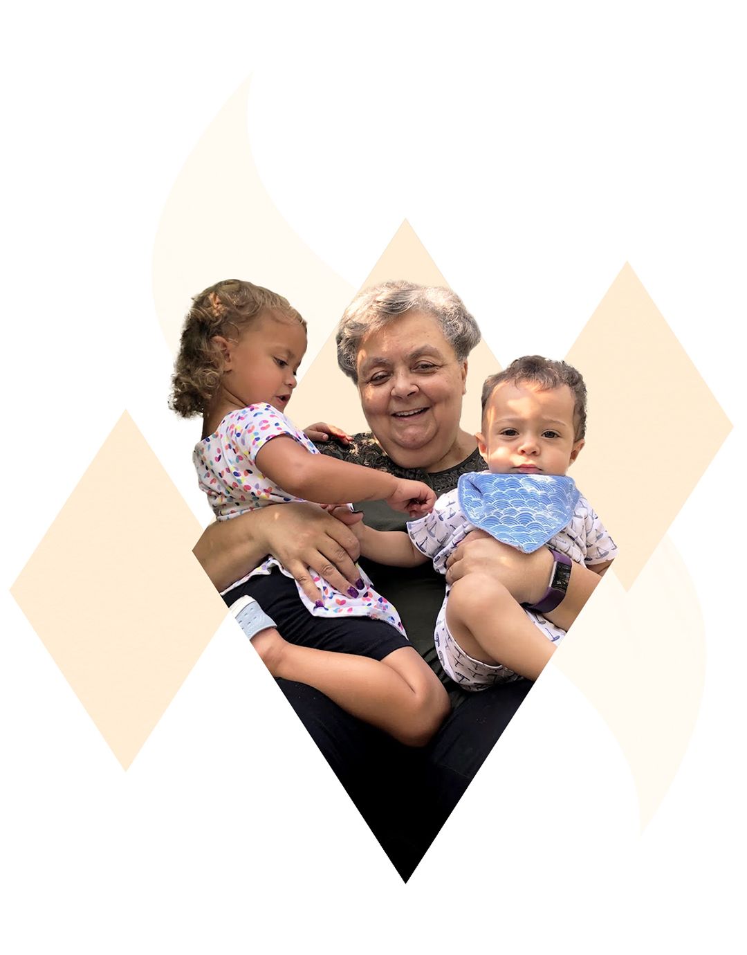 Smiling grandmother holding two children, showing warmth, family bonds, and intergenerational connection.